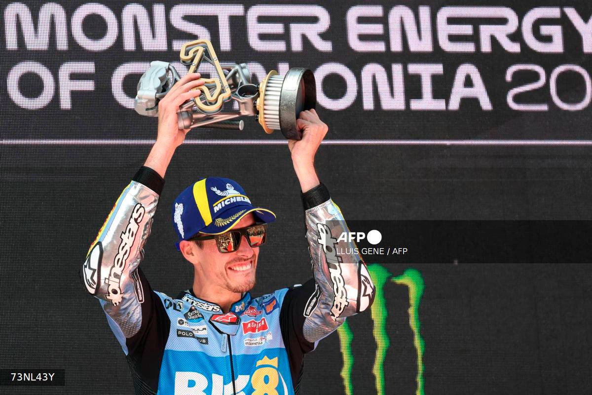 BK8 Gresini Racing MotoGP team's Spanish MotoGP rider Alex Marquez celebrates on the podium after winning the MotoGP Race of the Moto Grand Prix of Catalonia at the Circuit de Catalunya on September 7, 2025 in Montmelo on the outskirts of Barcelona. - AFP