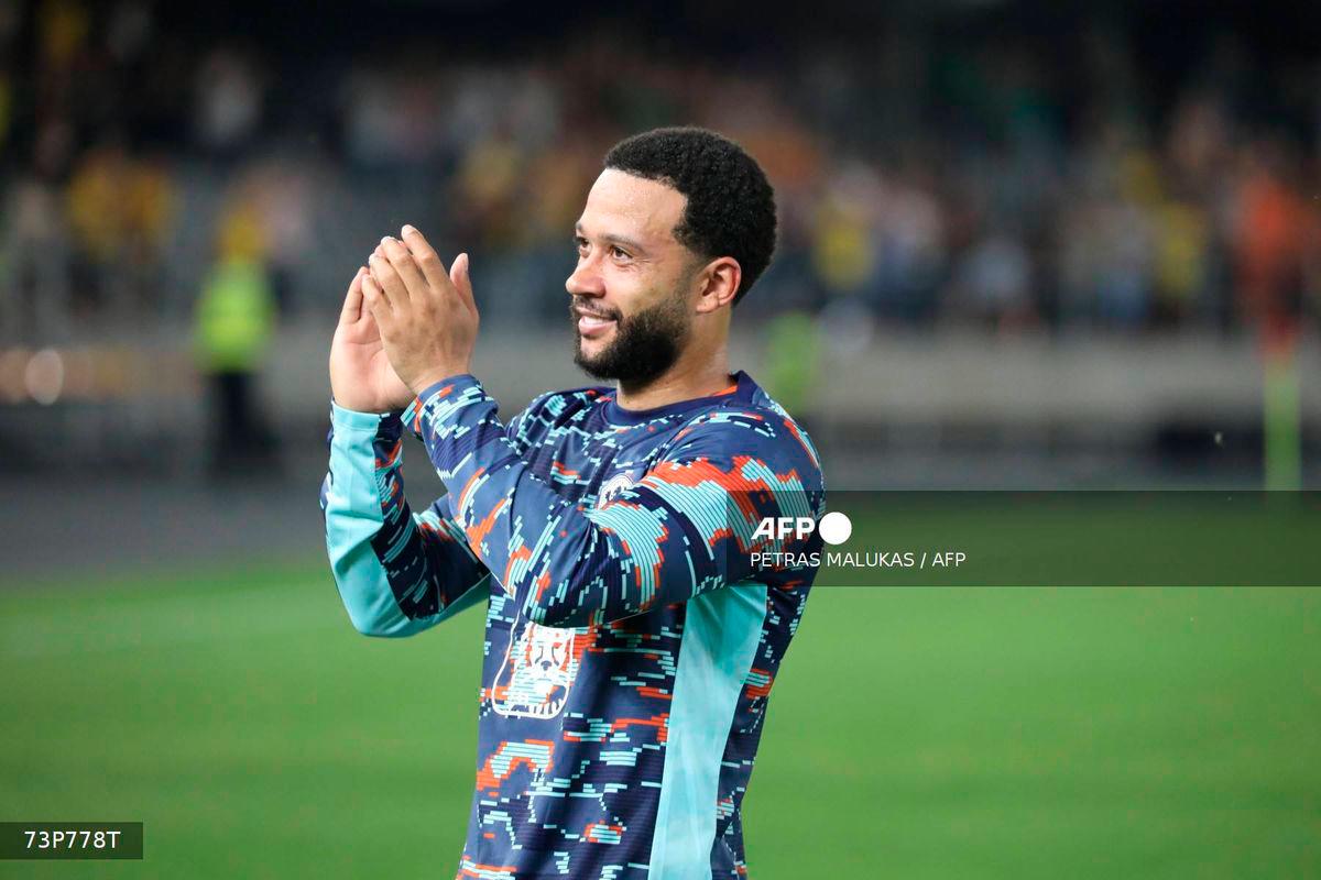Netherlands' forward #10 Memphis Depay reacts after the 2026 World Cup qualifiers Europe zone group G football match between Lithuania and The Netherlands, on September 7, 2025 in Kaunas, Lithuania. - AFP