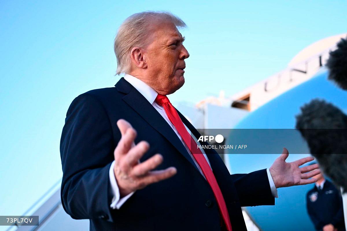 US President Donald Trump speaks to reporters after stepping off Air Force One upon returning to Joint Base Andrews in Maryland on September 7, 2025. - Mandel NGAN / AFP