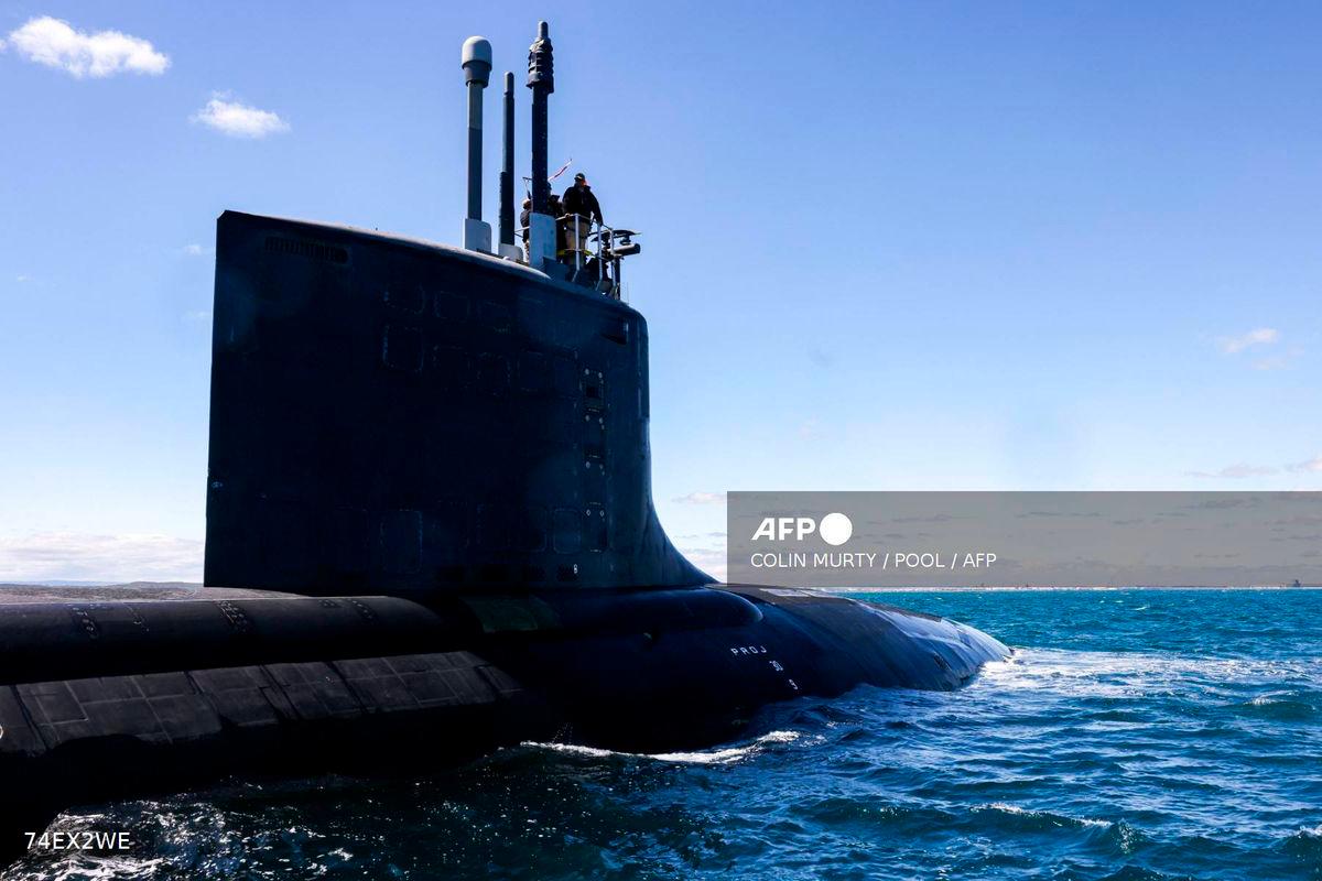 (FILES) The US Navy’s USS Minnesota (SSN-783), a Virginia-class fast attack submarine, sails in waters off the coast of Western Australia on March 16, 2025. (Photo by COLIN MURTY / POOL / AFP)