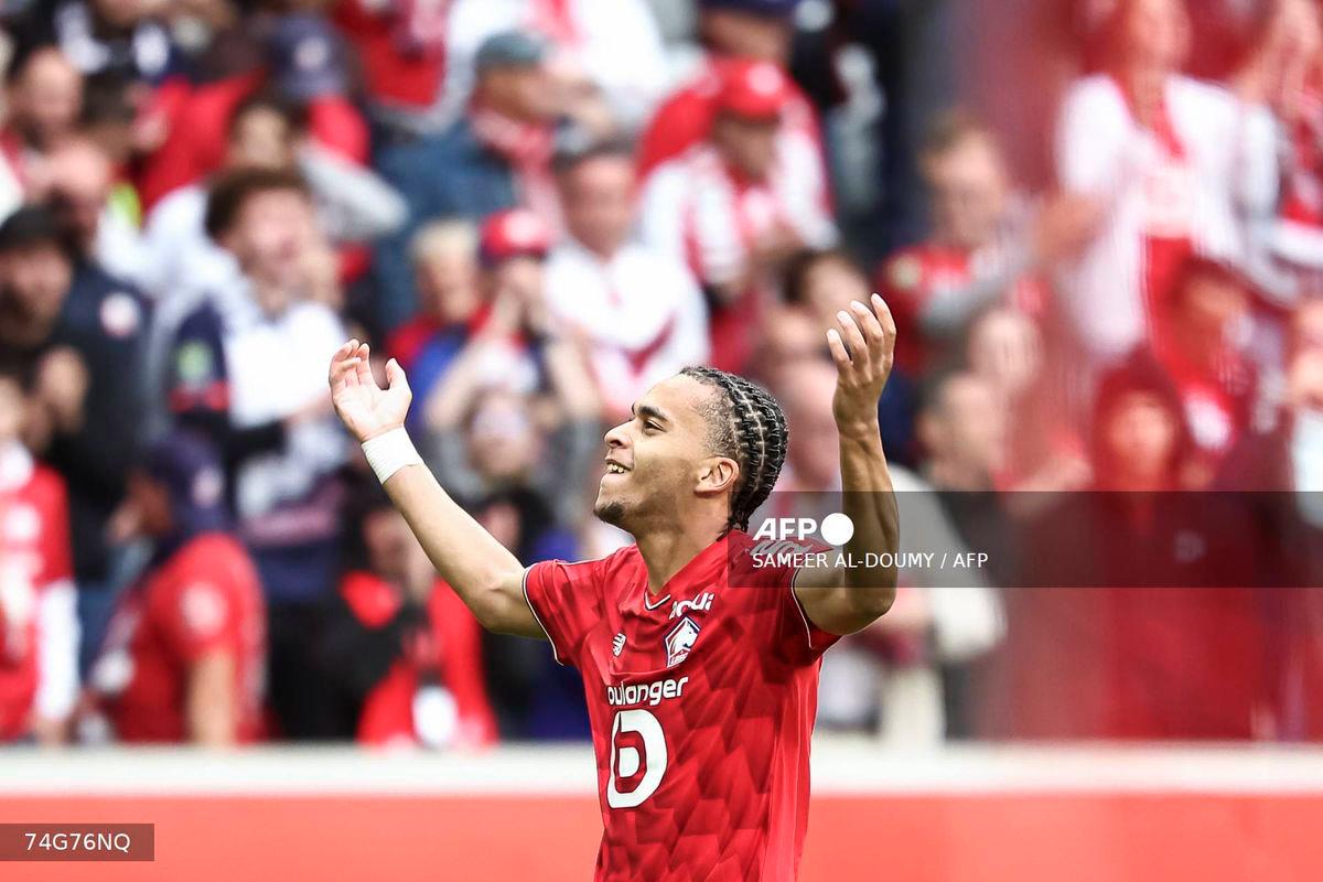 Lille's French midfielder #08 Ethan Mbappe celebrates after scoring his team's second goal during the French L1 football match between Lille LOSC and Toulouse FC at the Stade Pierre-Mauroy in Villeneuve-d'Ascq, northern France, on September 14, 2025. - AFP