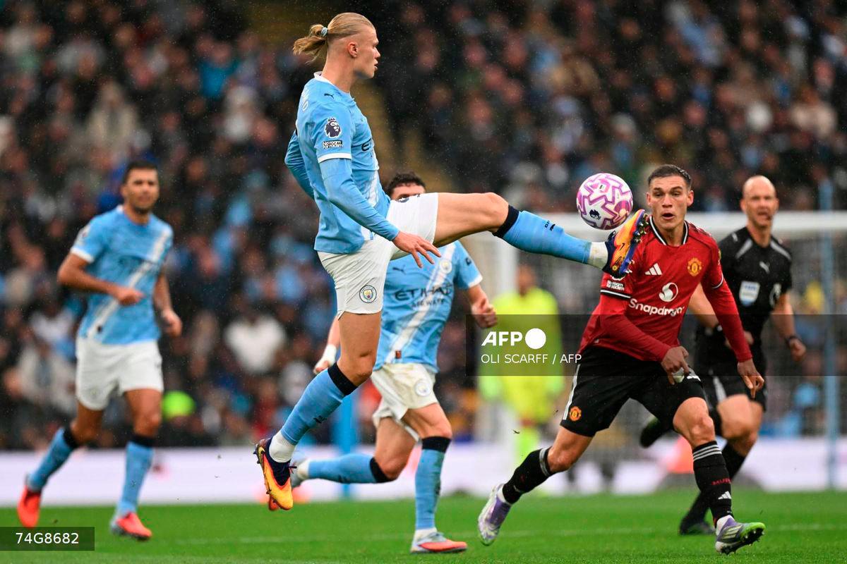 Manchester City's Norwegian striker #09 Erling Haaland controls the ball during the English Premier League football match between Manchester City and Manchester United at the Etihad Stadium in Manchester, north west England, on September 14, 2025. - AFP