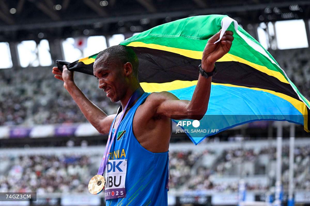 Tanzania’s athlete Alphonce Felix Simbu celebrates after winning the men’s marathon final during the World Athletics Championships in Tokyo on September 15, 2025. (Photo by Jewel SAMAD / AFP)