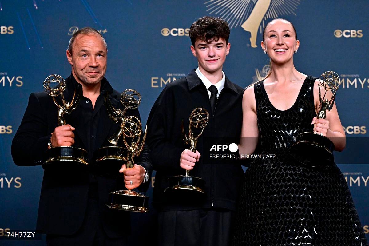 (L-R) Stephen Graham , Owen Cooper and Erin Doherty won the award for “Adolescence” during the 77th Primetime Emmy Awards at the Peacock Theatre at LA Live in Los Angeles on September 14, 2025. (Photo by Frederic J. Brown / AFP)
