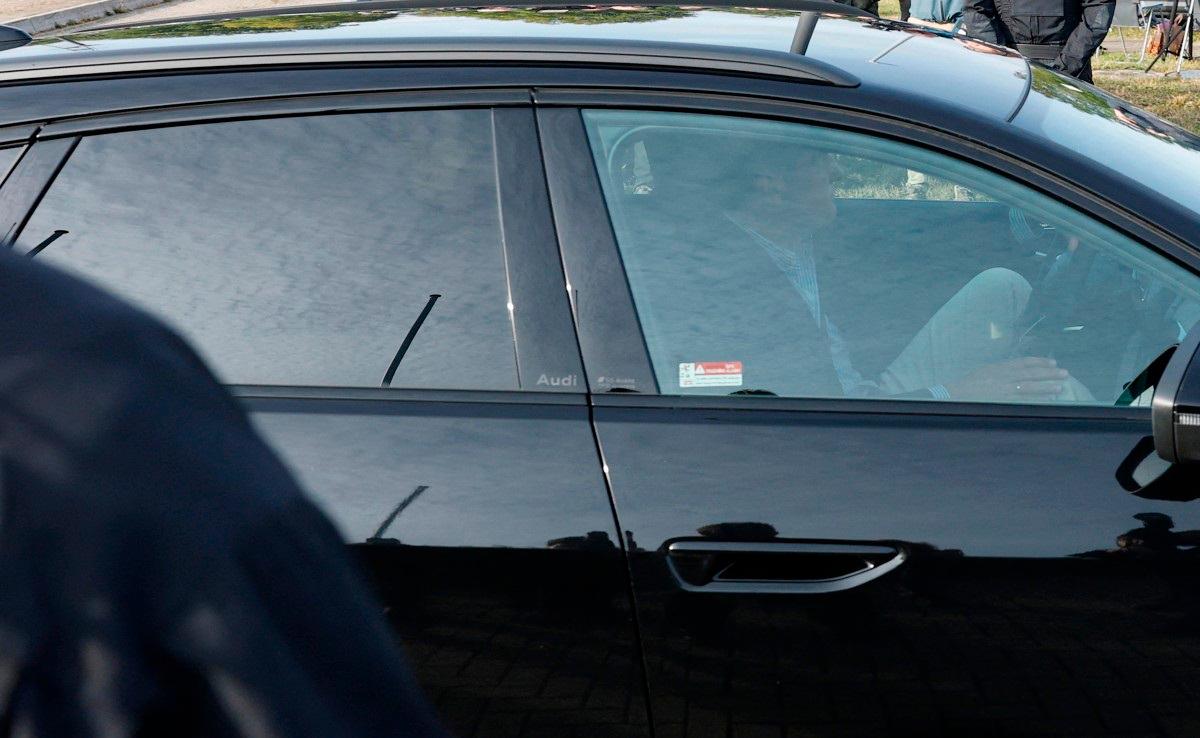 A black Audi driven by Christian B’s lawyer Friedrich Fuelscher and believed to be carrying Christian B is seen driving out of the high-security prison ‚Justizvollzugsanstalt Sehnde‘, where imprisoned Christian B, suspect in Madeleine McCann’s disappearance is due to be released on September 17, 2025, in Sehnde near Hanover, northern Germany. - Odd ANDERSEN / AFP