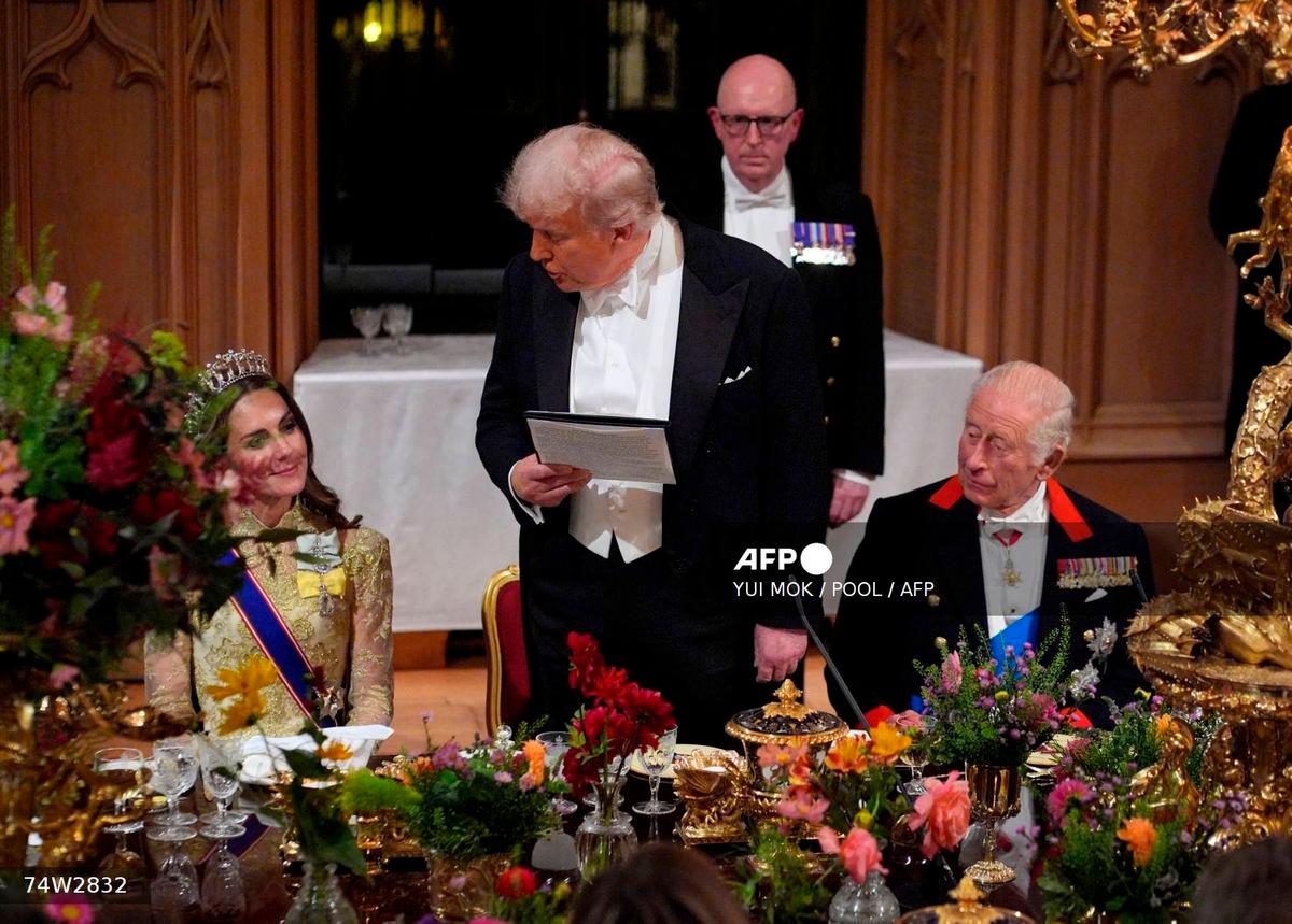 US President Donald Trump speaks to Britain’s Catherine, Princess of Wales as he delivers a speech during a State Banquet at Windsor Castle, in Windsor, on September 17, 2025, during the US President’s second State Visit. US President Donald Trump arrived in Britain for an unprecedented second State Visit, with the UK government rolling out a royal red carpet welcome to win over the mercurial leader. (Photo by Yui Mok / POOL / AFP)