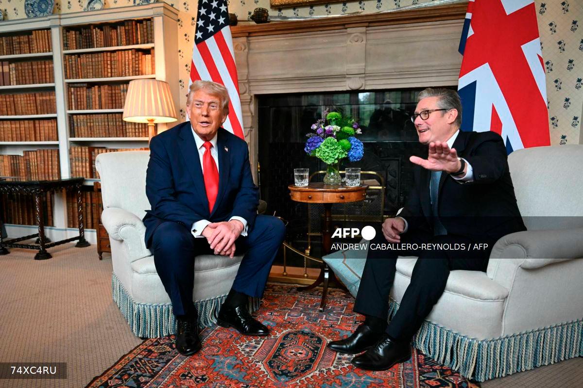 Britain's Prime Minister Keir Starmer and US President Donald Trump sit down for a bilateral meeting at Chequers, in Aylesbury, central England, on September 18, 2025, on the second day of the US President's second State Visit. - AFP