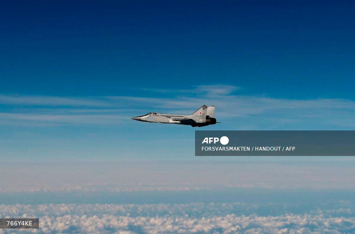 This September 19, 2025 Hand Out image released by the Swedish Airforce shows a Russian MIG-31 fighter jet flying above the Baltic sea after violating Estonian air space. - HANDOUT / AFP