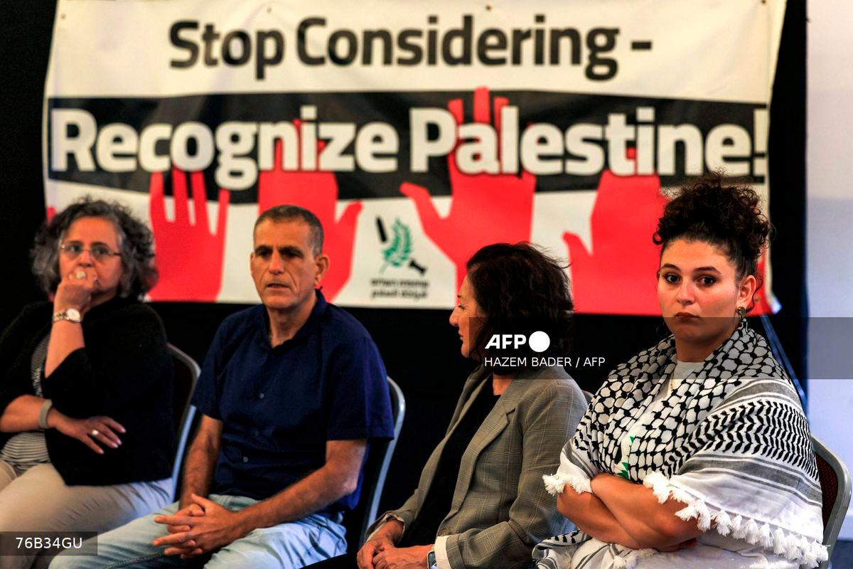 Israeli left-wing activists attend a press conference under the Partnership for Peace: Yes to Recognition slogan, in support of international recognition of Palestine, in Jerusalem on September 21, 2025. - AFP