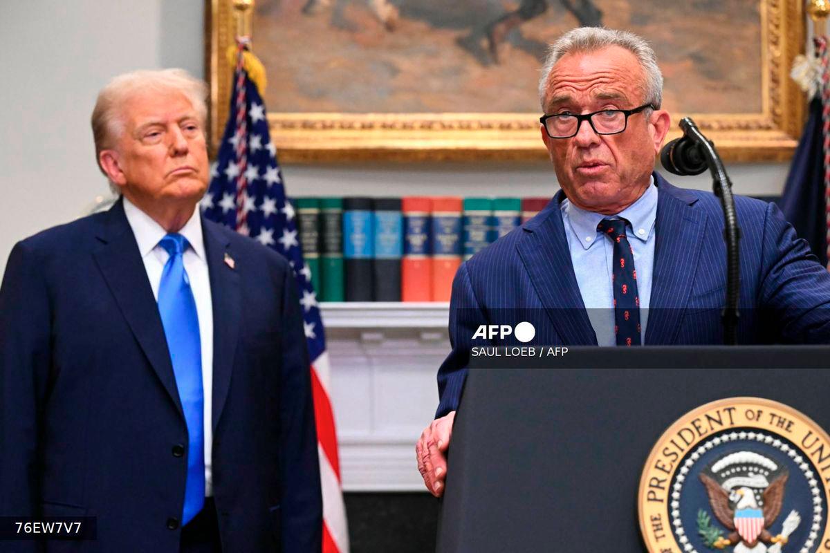 (L/R) US President Donald Trump looks on as US Secretary of Health and Human Services Robert F. Kennedy Jr. speaks during an event about autism in the Roosevelt Room of the White House in Washington, DC on September 22, 2025. - AFP