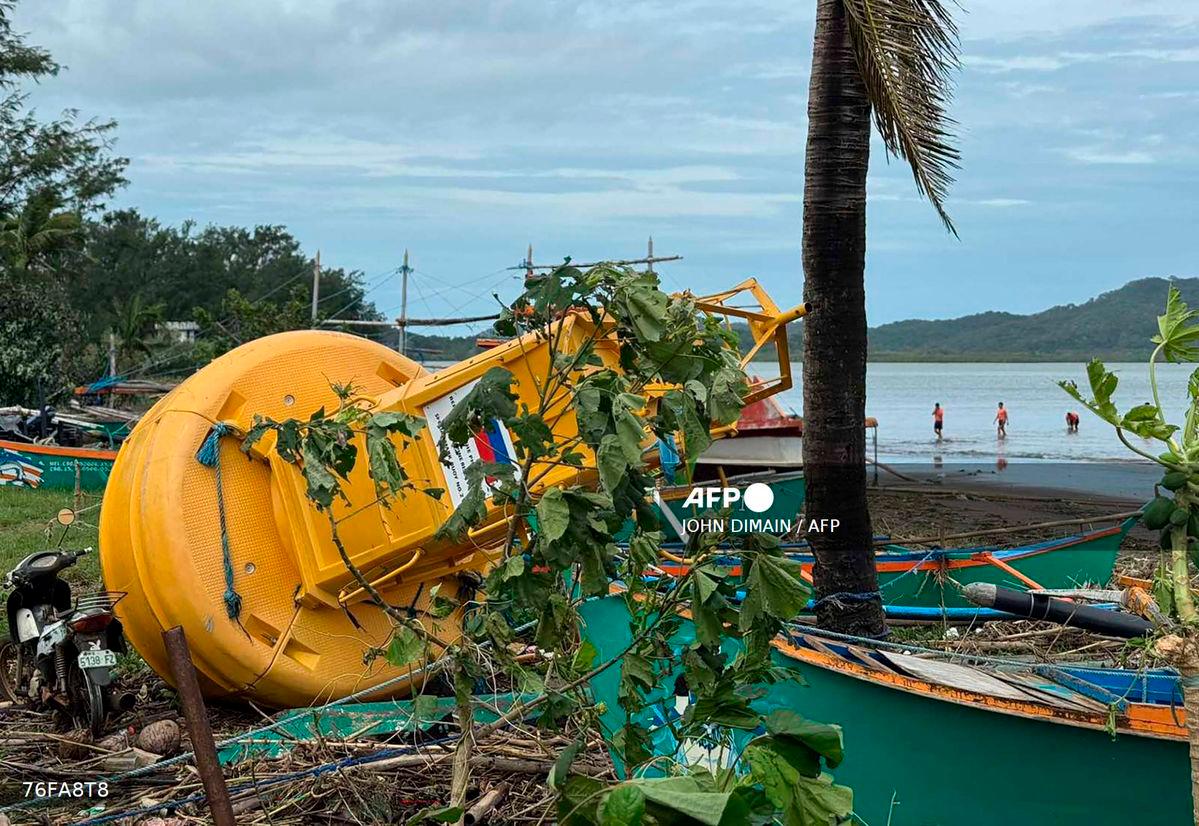 A navigational buoy is washed ashore at the height of Super Typhoon Ragasa in Santa Ana town, Cagayan province, north of Manila on September 23, 2025 - (Photo by John Dimain / AFP)