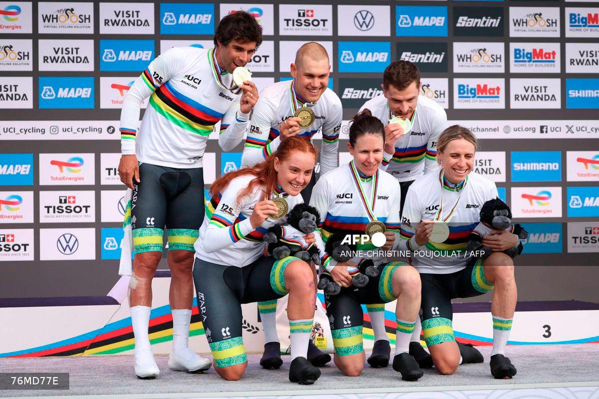 Gold medallists Australian rider Michael Matthews, Australian rider Lucas Plapp, Australian rider Jay Vine, Australian rider Brodie Chapman, Australian rider Amanda Spratt and Australian rider Felicity Wilson-Haffenden celebrate on the podium following the team time trial mixed relay cycling event during the UCI 2025 Road World Championships, in Kigali, on September 24, 2025. - AFP