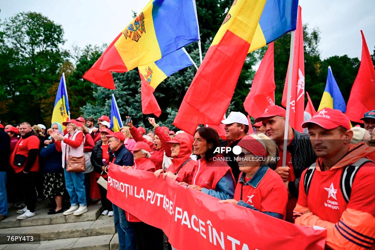 Supporters of The Patriotic Block (BEP) party take part in a rally in Chisinau on September 25, 2025, ahead of the parliamentary elections on September 28. - AFP