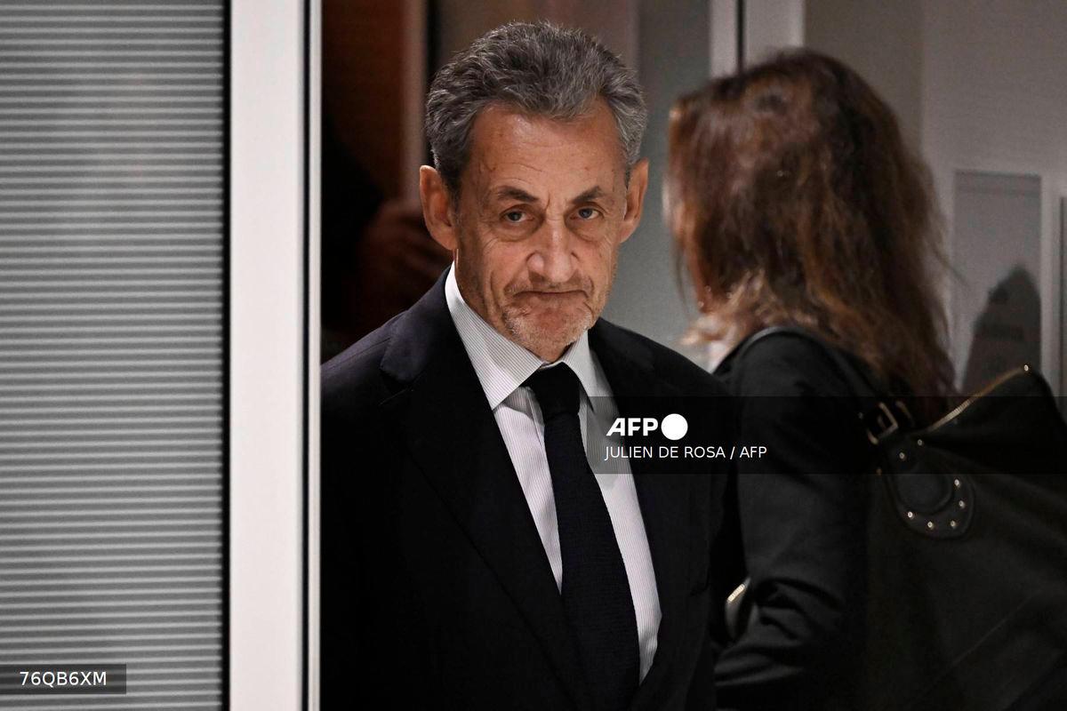 Former French president Nicolas Sarkozy leaves after the verdict in his trial for illegal campaign financing from Libya for his successful 2007 presidential bid, at the Tribunal de Paris courthouse in Paris, on September 25, 2025. - AFP