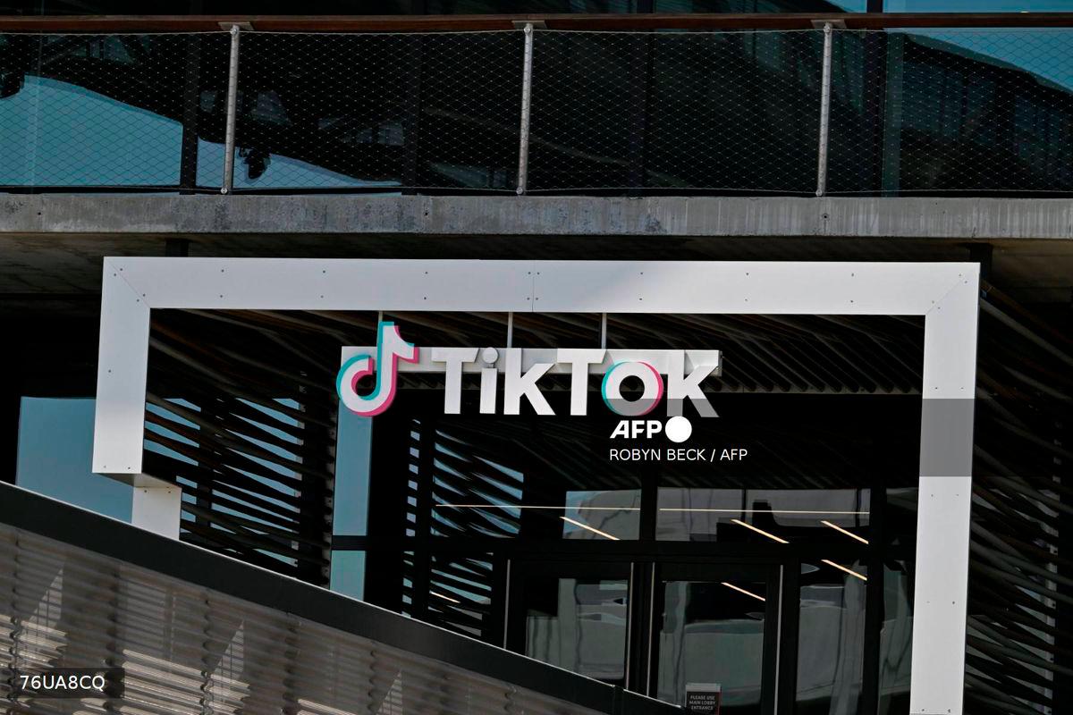(FILES) The TikTok logo is seen outside the Chinese video app company’s Los Angeles offices on April 4, 2025 in Culver City, California. China said on September 26, 2025 it hoped the United States would provide open and fair treatment for TikTok and other Chinese companies investing in the country, after President Donald Trump signed an executive order on a proposed deal for a US version of the popular app. - AFP