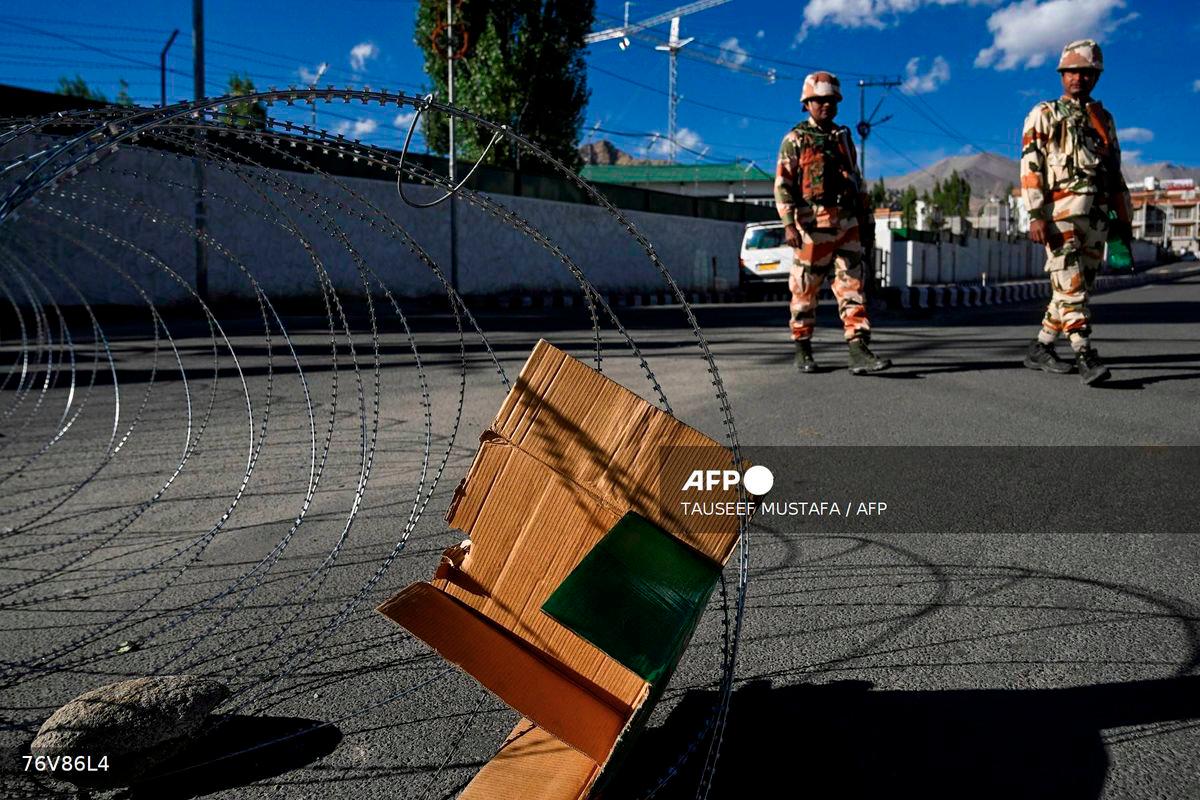 Indo-Tibetan Border Police (ITBP) personnel patrol along a road during a curfew after unrest in Leh on September 26, 2025. - AFP