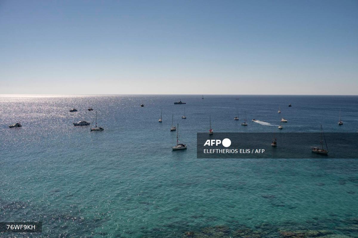 A group of ships of the Global Sumud Flotilla to Gaza are shown moored at the small island of Koufonisi, south of the island of Crete on September 26, 2025. - AFPPIX