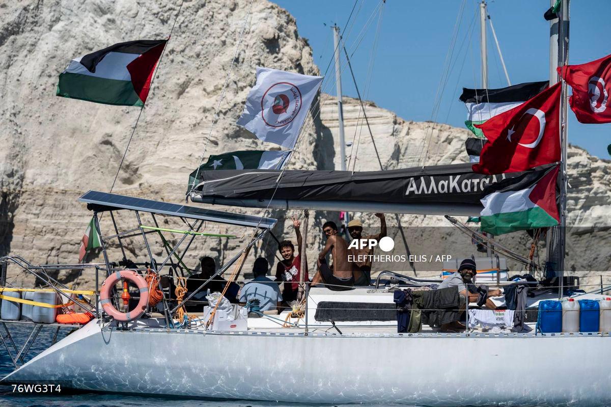 Members of the group of ships of the Global Sumud Flotilla to Gaza are seen moored at the small island of Koufonisi, south of the island of Crete, on September 26, 2025. (Photo by Eleftherios ELIS / AFP)
