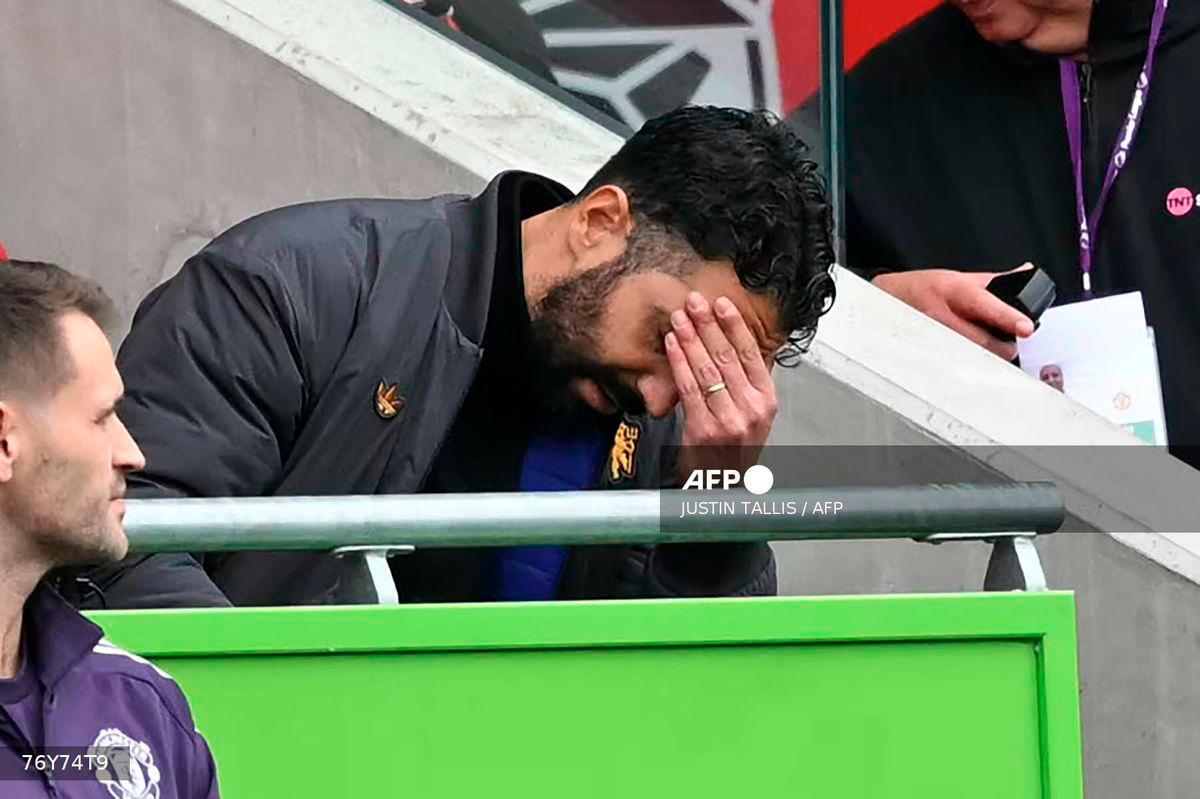 Manchester United's Portuguese head coach Ruben Amorim reacts in his seat during the English Premier League football match between Brentford and Manchester United at the Gtech Community Stadium in London on September 27, 2025. - AFP