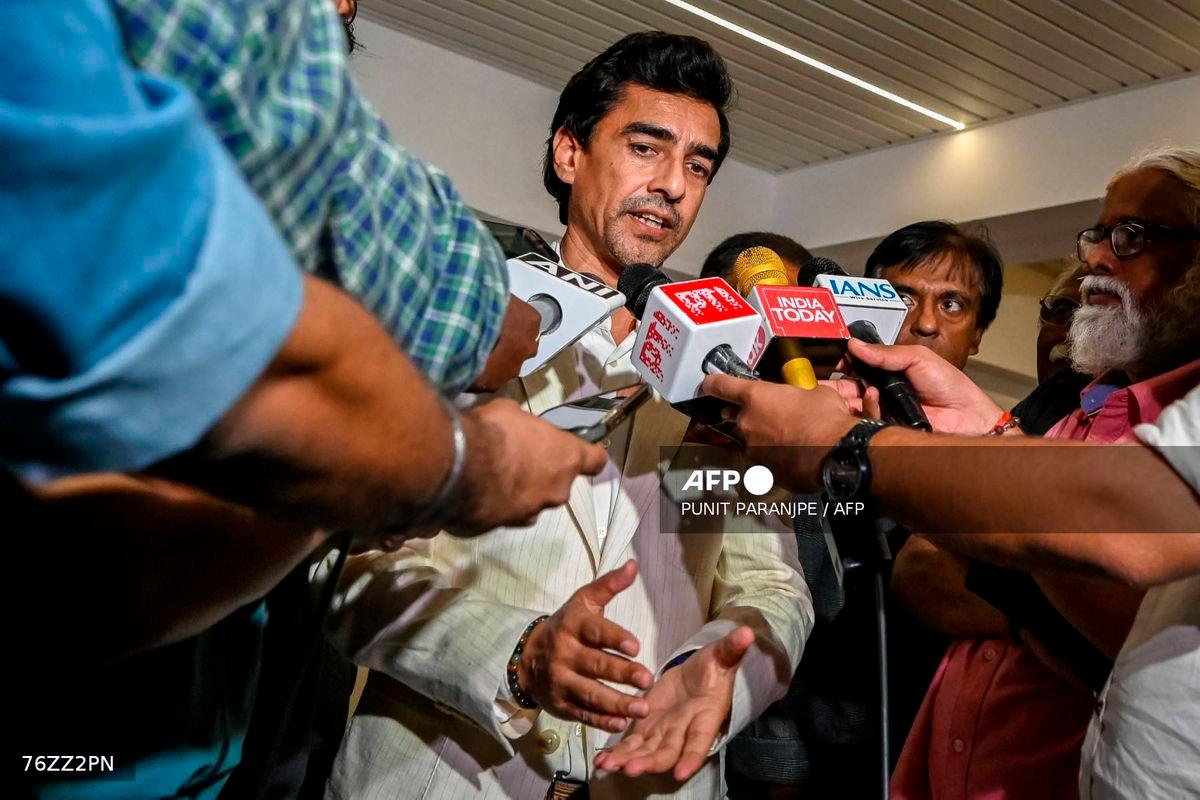 Mithun Manhas, newly elected President of the Board of Control for Cricket in India (BCCI), speaks with media after attending the Annual General Meeting (AGM) at their headquarters in Mumbai on September 28, 2025. (Photo by Punit PARANJPE / AFP)