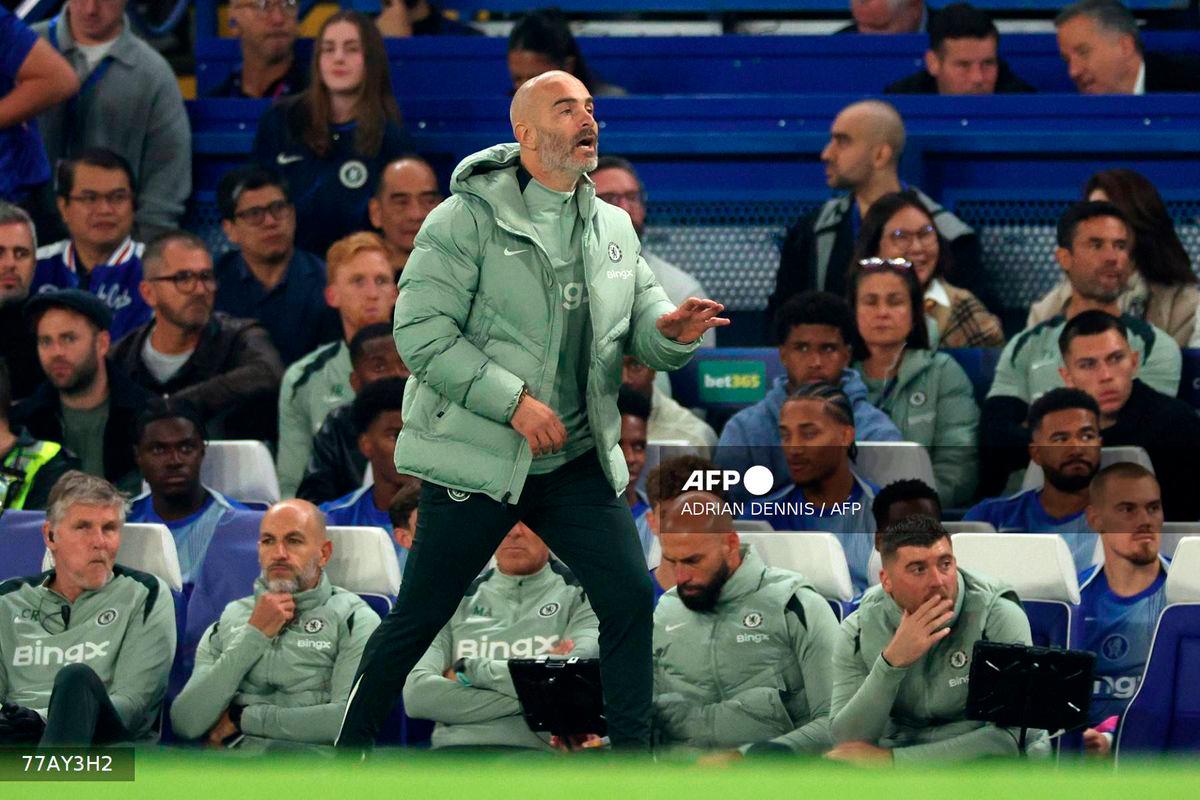 Chelsea's Italian head coach Enzo Maresca shouts instructions to his players from the touchline during the UEFA Champions League, league phase football match between Chelsea and Benfica at Stamford Bridge in London on September 30, 2025. - AFP