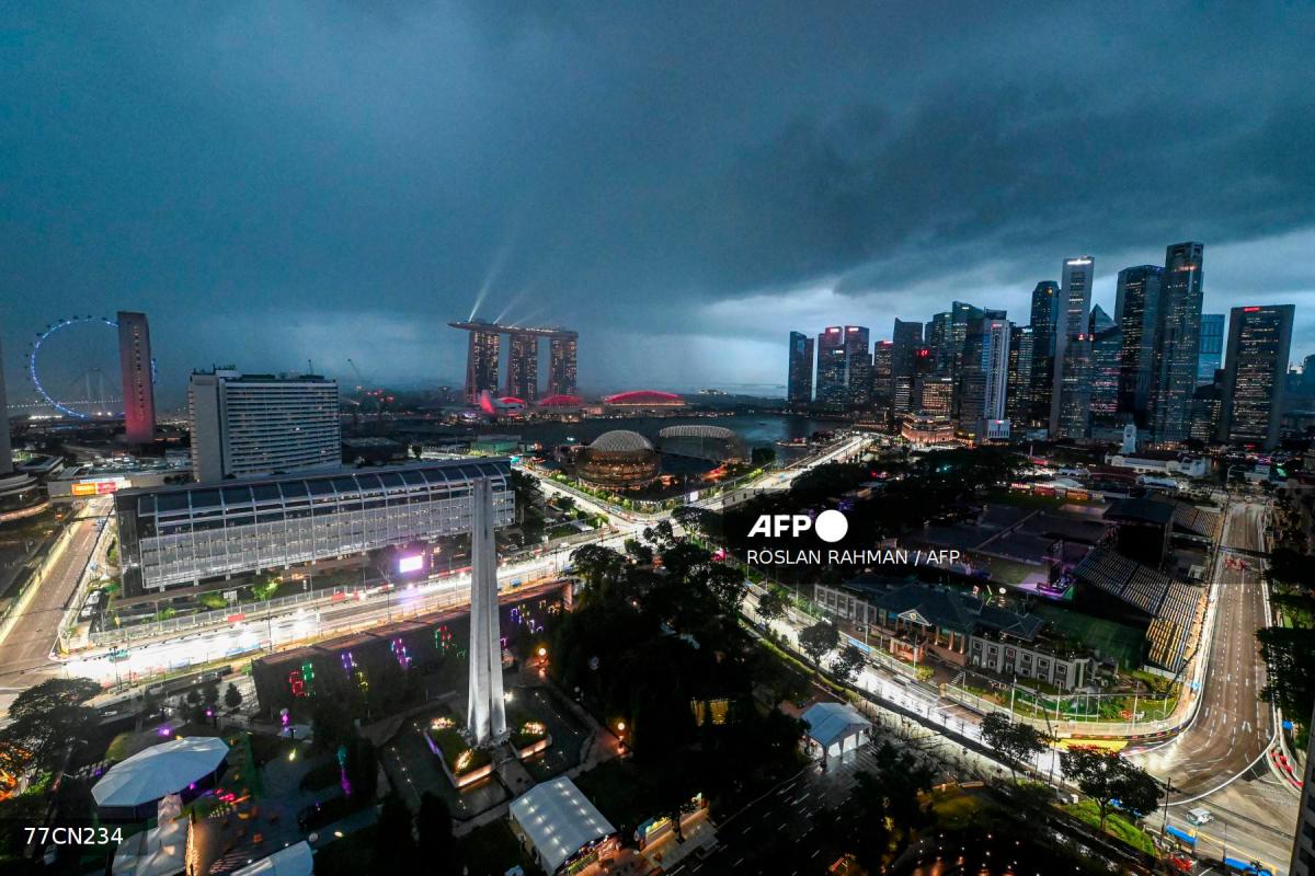 This photo shows the road circuit illuminated for the the upcoming Formula One Singapore Grand Prix at the Marina Bay Street Circuit in Singapore on October 1, 2025. - AFPPIX