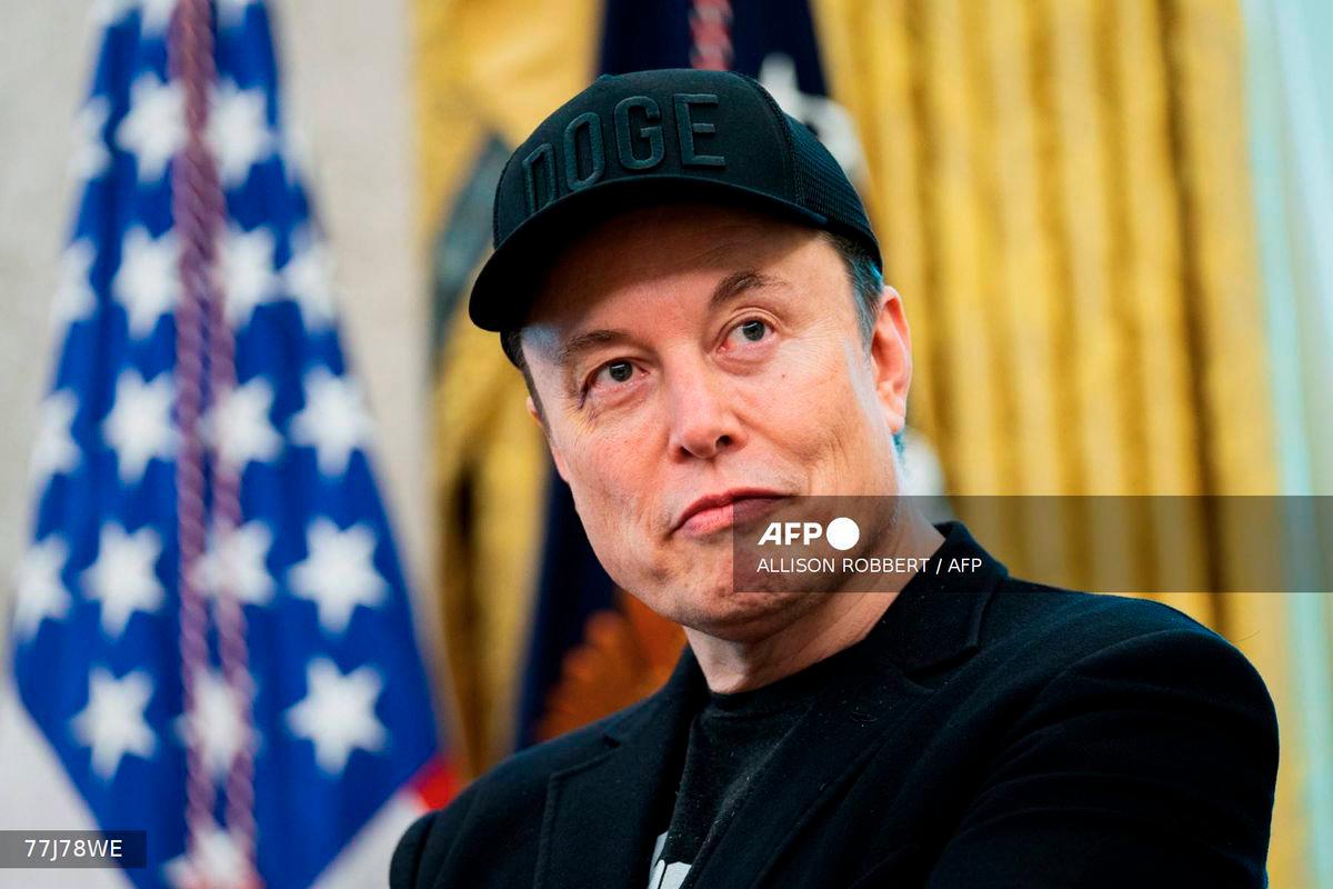 (FILES) Elon Musk looks on during a news conference with US President Donald Trump in the Oval Office of the White House in Washington, DC, on May 30, 2025. - AFP