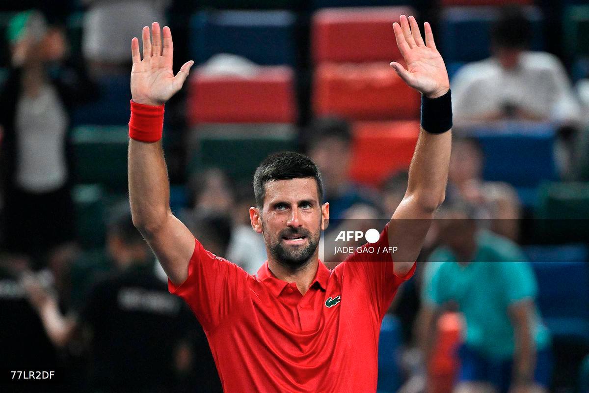Serbia's Novak Djokovic reacts after winning against Croatia's Marin Cilic in their men's singles match at the Shanghai Masters tennis tournament in Shanghai on October 3, 2025. - AFP