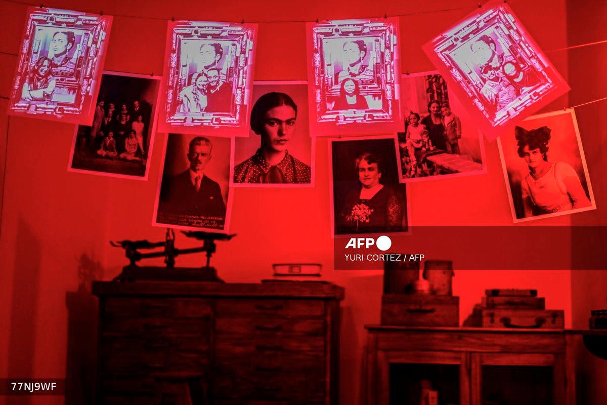 A projection illuminates the belongings of Mexican painter Frida Kahlo at the Casa Kahlo Museum in the Coyoacan neighborhood of Mexico City on October 3, 2025. - AFP