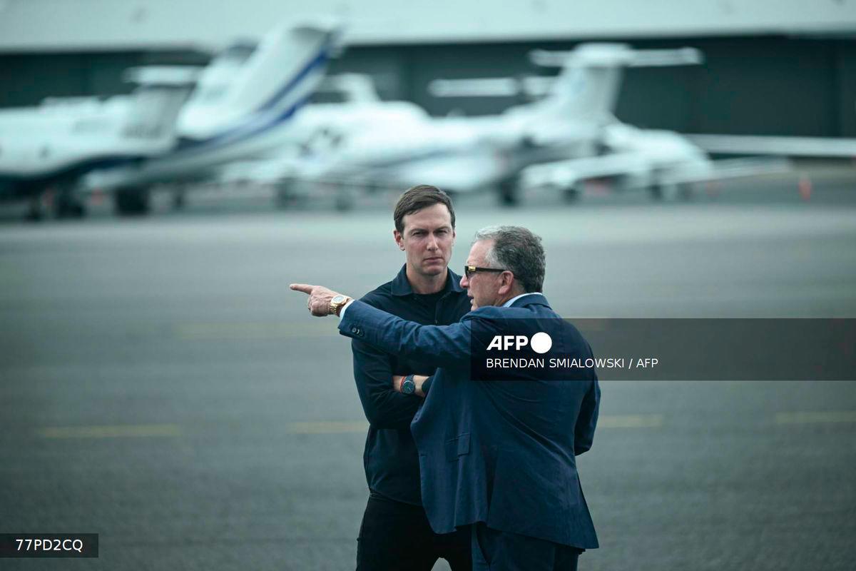 (FILES) US special envoy to the Middle East Steve Witkoff (R) and Jared Kushner await the arrival of President Donald Trump and First Lady Melania Trump at Teterboro Airport in Teterboro, New Jersey, on July 13, 2025. - AFP