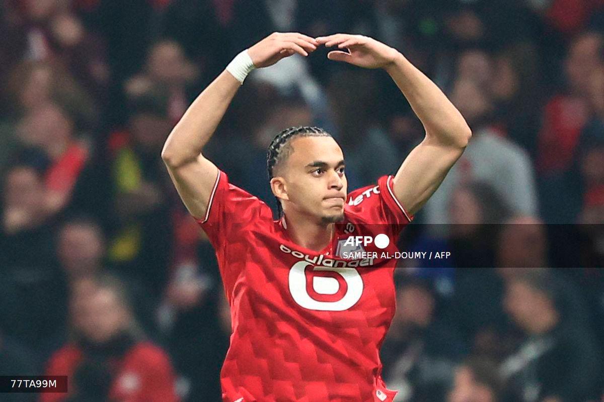 Lille's French midfielder #08 Ethan Mbappe celebrates after scoring Lille's first goal during the French L1 football match between Lille LOSC and Paris Saint-Germain (PSG) at the Stade Pierre-Mauroy in Villeneuve-d'Ascq, northern France, on October 5, 2025. - AFP