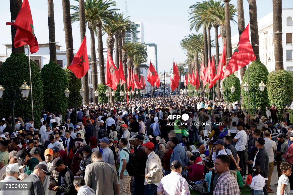 Crowds gather in front of the Moroccan Parliament headquarters in Rabat on October 10, 2025, as the King prepares to chair the opening of the 1st session of 5th legislative year. - AFP