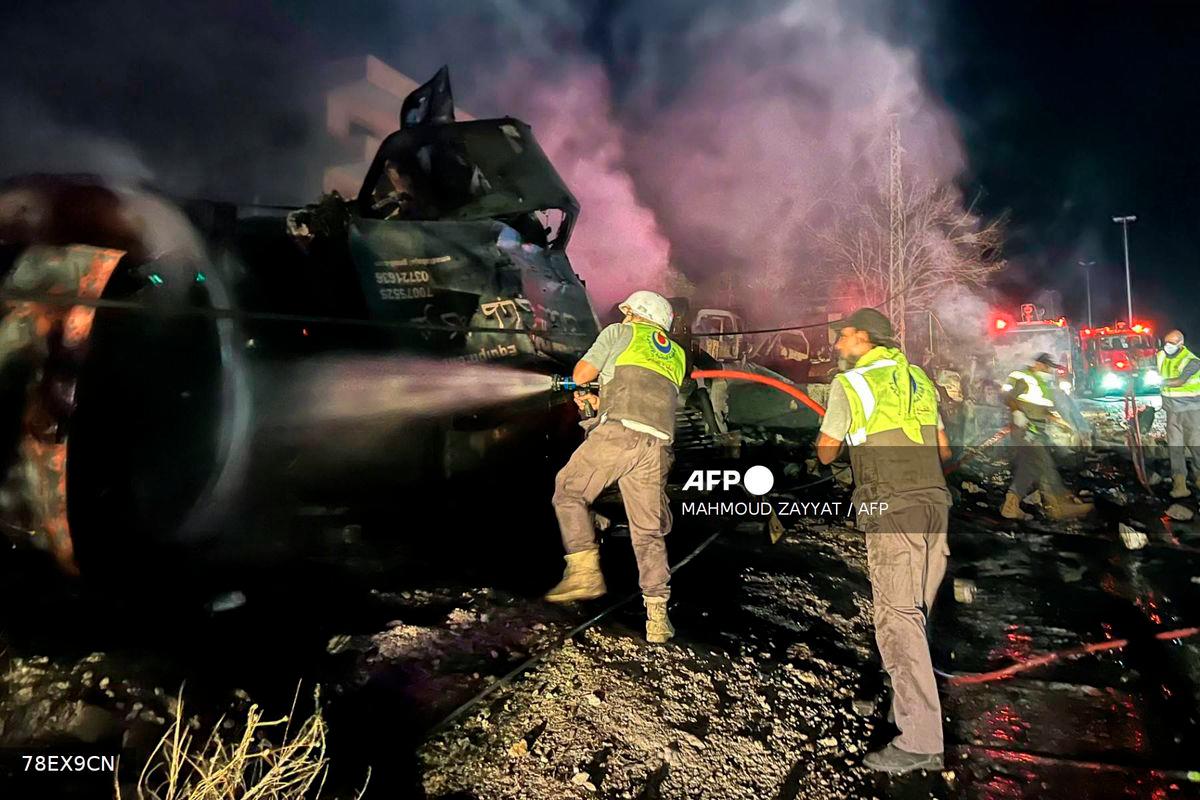 Firefighters douse the flames at the site of an overnight Israeli strike in Al-Msayleh area in southern Lebanon on October 11, 2025. Lebanese President Joseph Aoun condemned Israel on October 11 for carrying out overnight strikes on civilian facilities that the health ministry said killed at least one person. - AFP