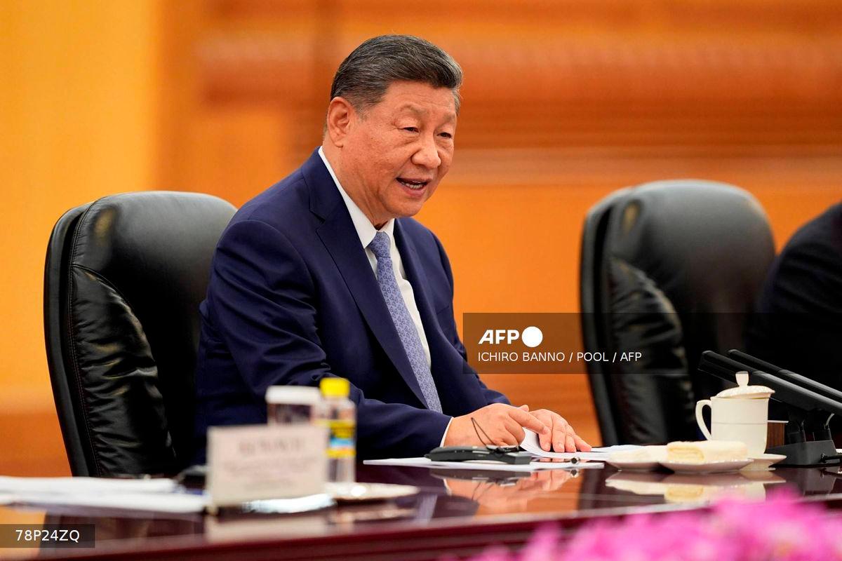 Chinese President Xi Jinping speaks during a meeting with Sri Lanka’s Prime Minister Harini Amarasuriya (not pictured) at the Great Hall of the People in Beijing on October 14, 2025. (Photo by Ichiro Banno / POOL / AFP)