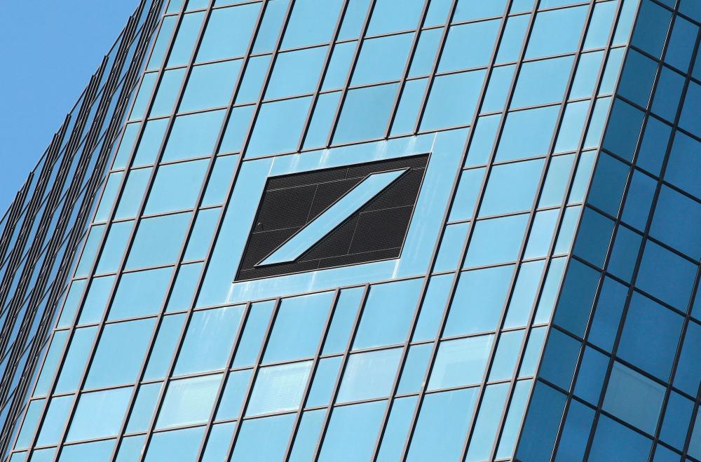 (FILES) In this file photo taken on February 07, 2023 the headquarters of German bank Deutsche Bank with its logo are pictured in Frankfurt am Main, western Germany. - AFPPIX