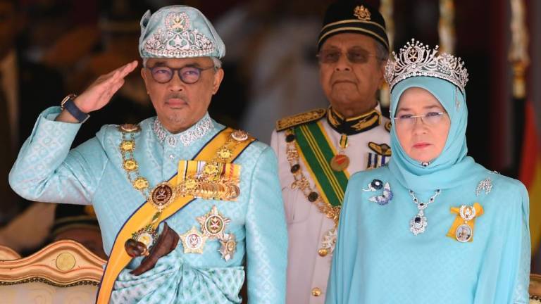 The Yang di-Pertuan Agong Al-Sultan Abdullah Ri’ayatuddin Al-Mustafa Billah Shah (L) and Raja Permaisuri Agong Tunku Hajah Azizah Aminah Maimunah Iskandariah.