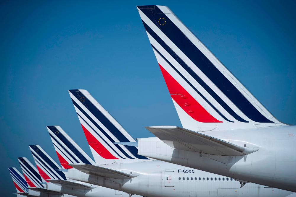 File picture of Air France planes parked on the tarmac of Roissy-Charles de Gaulle Airport. – AFP