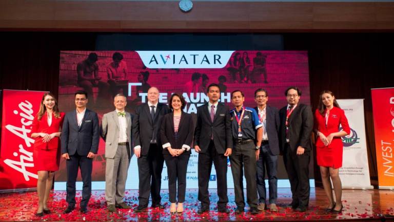 Aireen (fifth from left) and Dr Mohd Nor at the launch of Aviatar 2019. — Sunpix by Amirul Syafiq Mohd Din