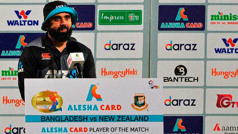 New Zealand’s Ajaz Patel poses for pictures after receiving ‘Player of the Match’ prize at the end of the third Twenty20 international cricket match against Bangladesh at the Sher-e-Bangla National Cricket Stadium in Dhaka. – AFPPIX