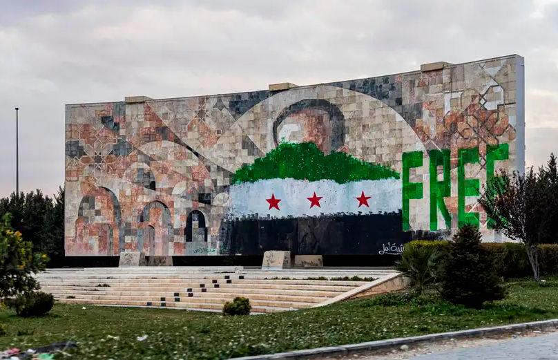 A picture of Syria’s first dictator, Hafez Assad, a member of the Alawite minority, was painted over after his son, Bashar, was ousted in December 2024Image: SAMEER AL-DOUMY/AFP/Getty Images