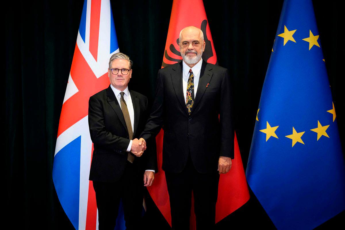 Britain’s Prime Minister Keir Starmer (L) poses for pictures with a Albania’s Prime Minister Edi Rama before their meeting at the Kryeministria Prime Minister’s office in Tirana on May 15, 2025. AFPpix