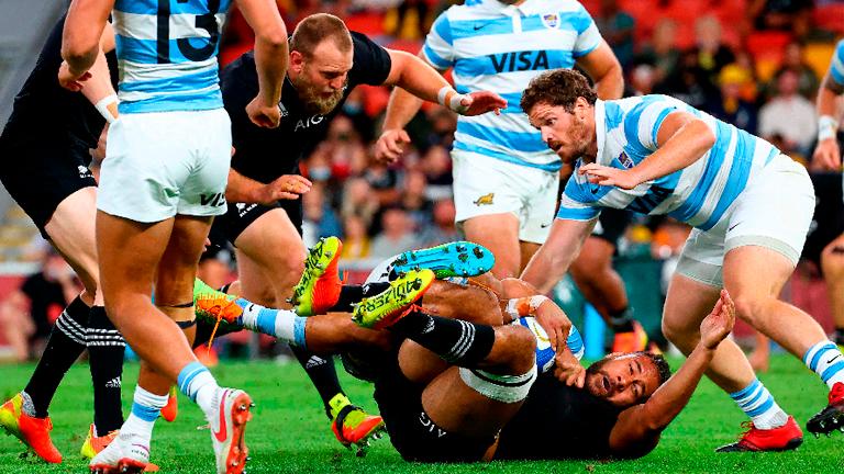 New Zealand’s Patrick Tuipulotu (bottom) is tackled during the rugby Championship match against Argentina. – AFPPIX