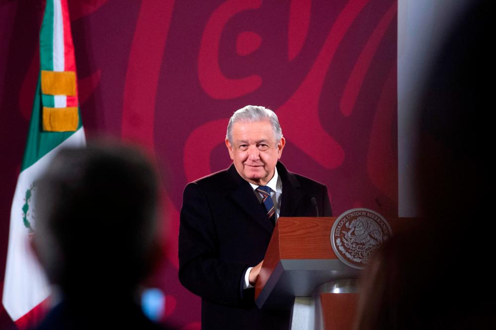 Mexican President Andres Manuel Lopez Obrador holds his morning news conference at the National Palace in Mexico City, Mexico January 21, 2022. Mexico's Presidency/Handout via REUTERSpix