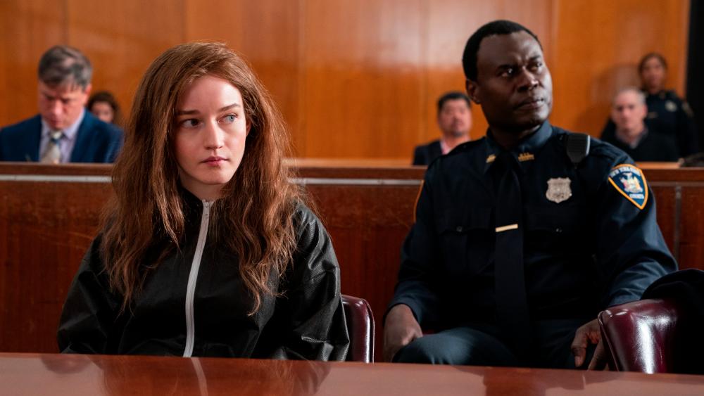 Julia Garner as Delvey in one of her court hearings. — NETFLIX