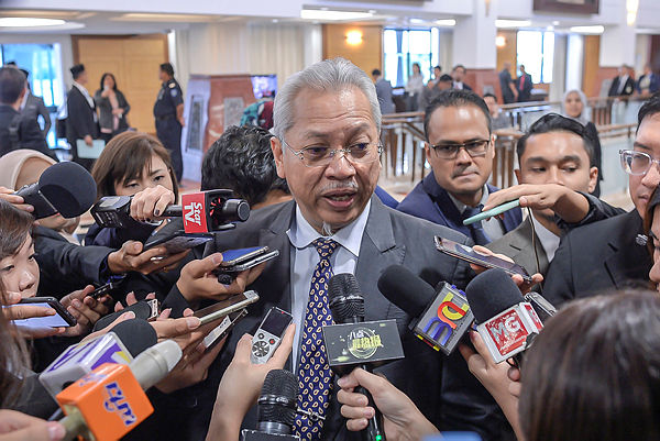 Umno secretary-general Tan Sri Annuar Musa speaks to the media during the Dewan Rakyat sitting at Parliament, on March 13, 2019. — Sunpix Adib Rawi Yahya