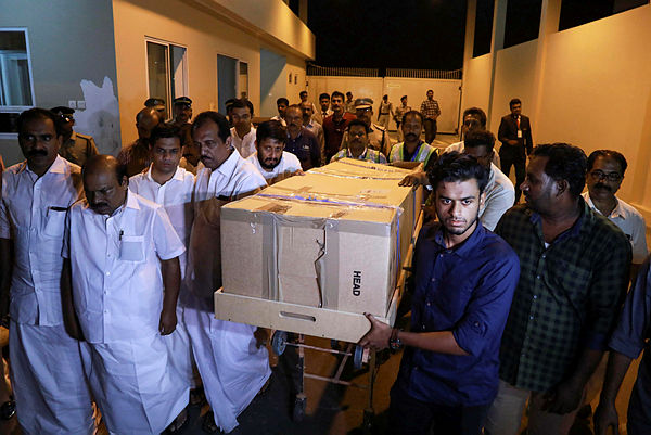 The body of Ansi Alibava, who was killed during the New Zealand mosque attacks, is carried upon arrival at Cochin International Airport in Kochi — AFP