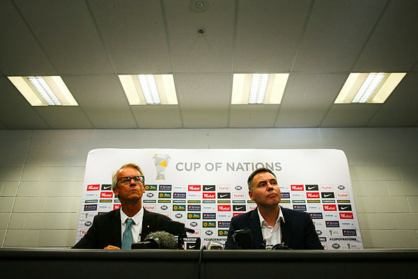 Football Federation Australia Chief Executive Officer David Gallop (L) and newly appointed head coach of the Australian national women’s football team Ante Milicic attend a press conference at Suncorp Stadium in Brisbane — AFP