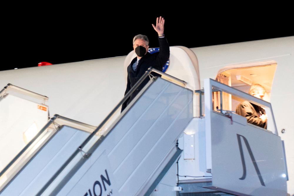 U.S. Secretary of State Antony Blinken waves as he arrives at Geneva Airport, in Geneva, Switzerland January 20, 2022. Alex Brandon/Pool via REUTERSpix