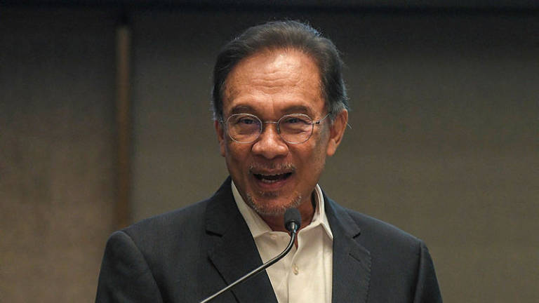 Anwar pleased Azmin not linked to sex videos