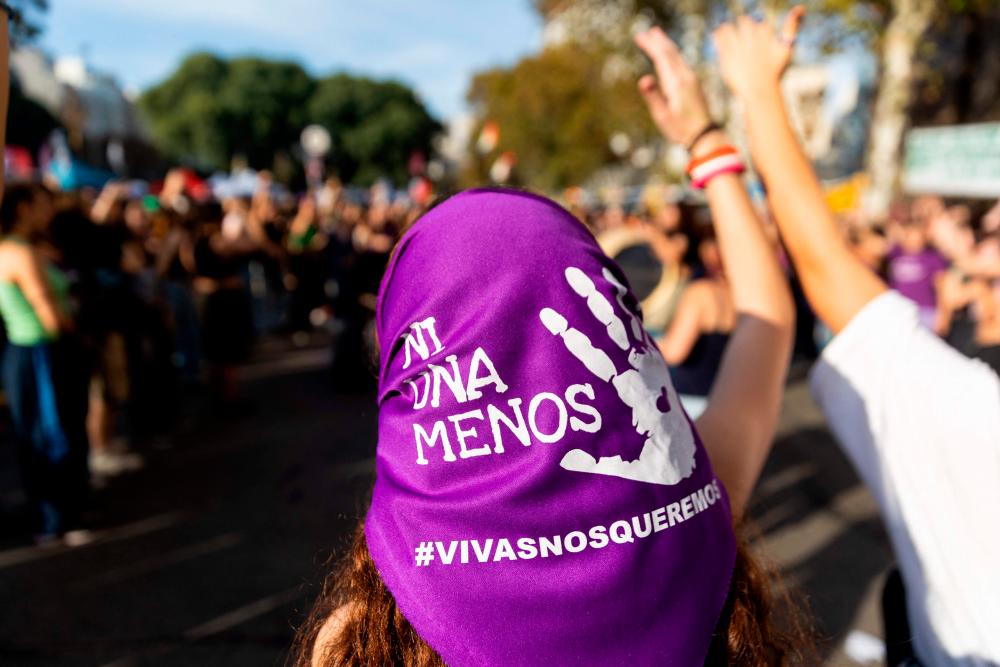 An activist wearing a headscarf takes part in the 8th annual “Ni una menos” (Not One Less) demonstration against gender violence in front of the Argentine National Congress in Buenos Aires, on June 3, 2023/AFPPix